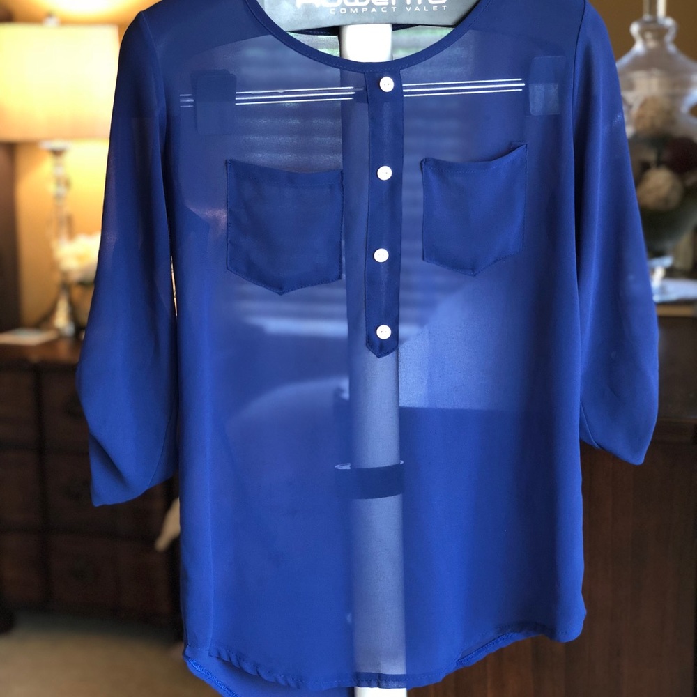 Blue sheer blouse w/ white buttons